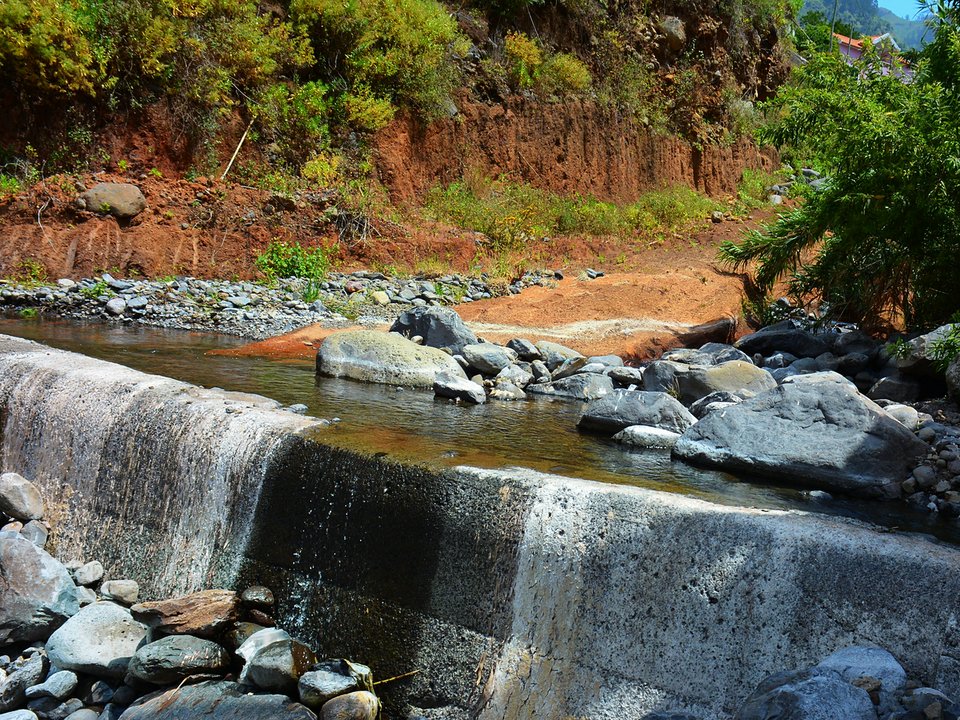 Masonry water channel and inspection path of Levada da Corujeira near Sítio da Terça, Ribeira da Tabua in Ribeira Brava