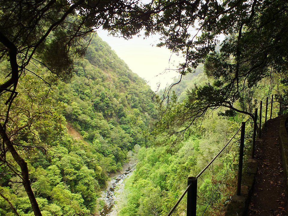 Masonry water channel and inspection path of Levada da Referta near Ribeira de São Roque do Faial in Machico
