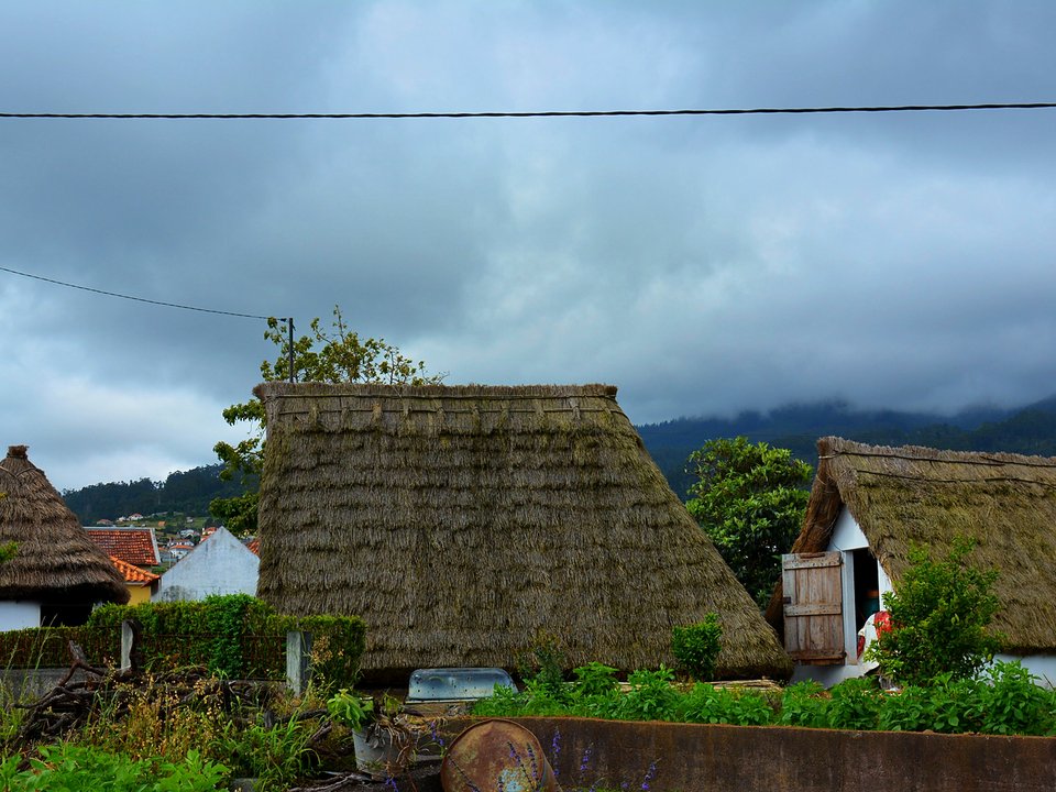 Levada do Cantinho above the Santana terraces, looking toward the Pico Ruivo massif and Pico das Empenas