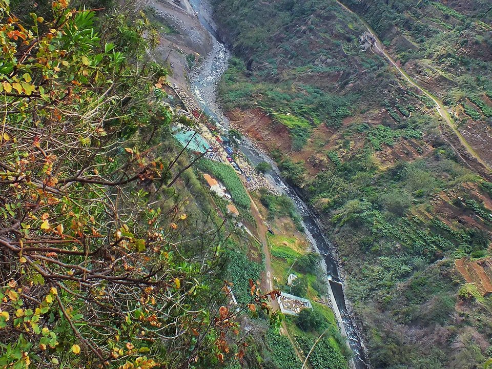 Contouring irrigation conduit of Levada do Curral approaching Pico do Bucho, São Martinho, Funchal in Câmara de Lobos