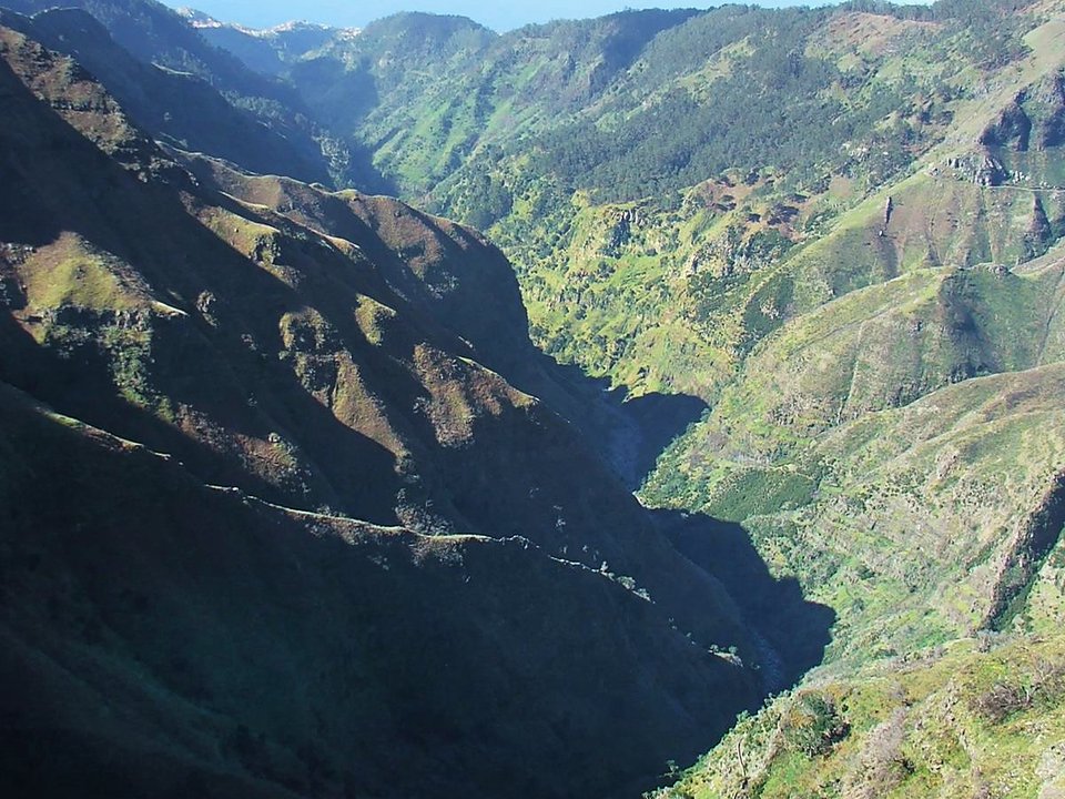 Contouring irrigation conduit of Levada do Paul approaching Calheta Hydroelectric Forebay in Calheta