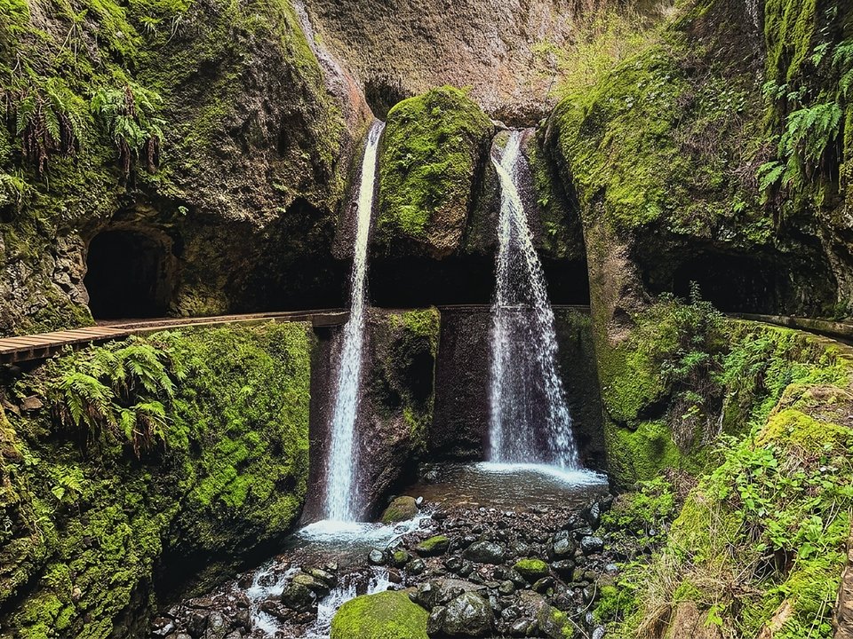 Dramatic canyon ledge and deep river gorge along Levada Nova da Tábua
