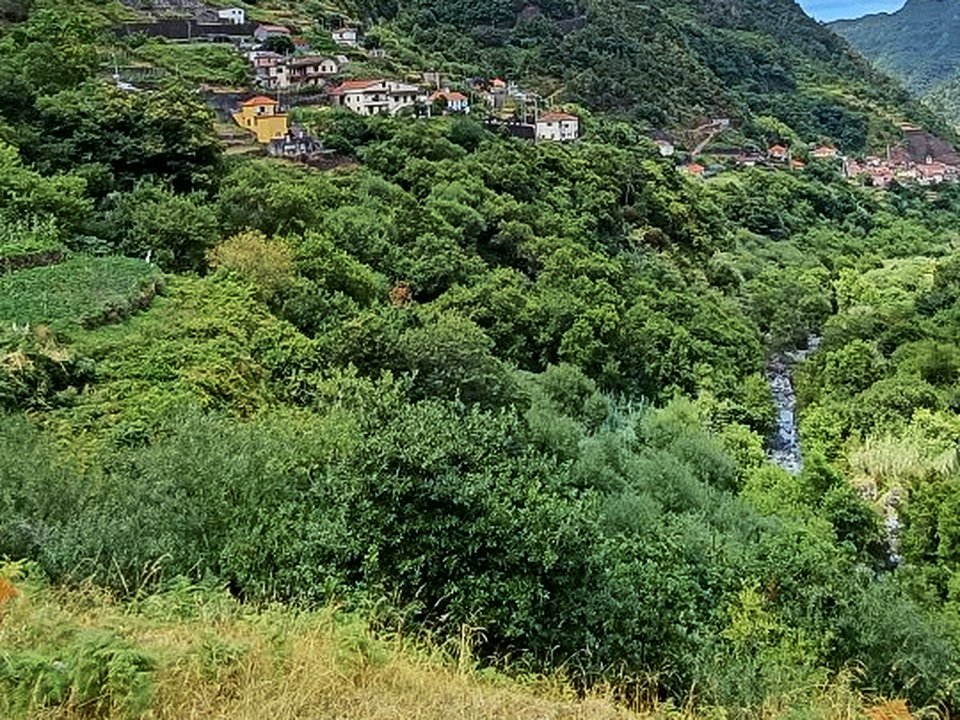 Hidden river pool and pristine mountain cascade at Poço das Casas in Boaventura