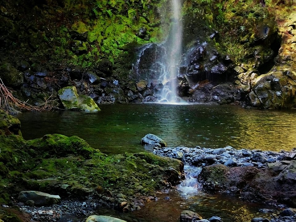 Dramatic canyon amphitheater and clear mountain waters deep in the Ribeira da Janela wilderness
