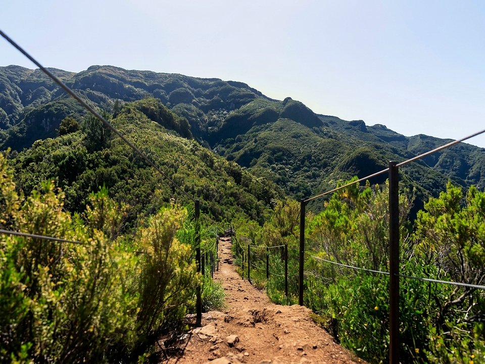 Wild mountain ridge path overlooking the northern gorges of São Vicente