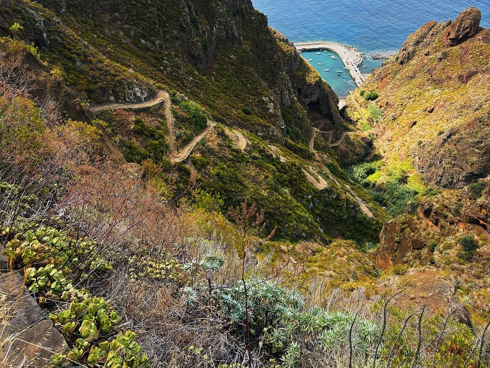 Steep cliffside switchbacks and basalt cobblestones plunging 500m to the sea on PR 19