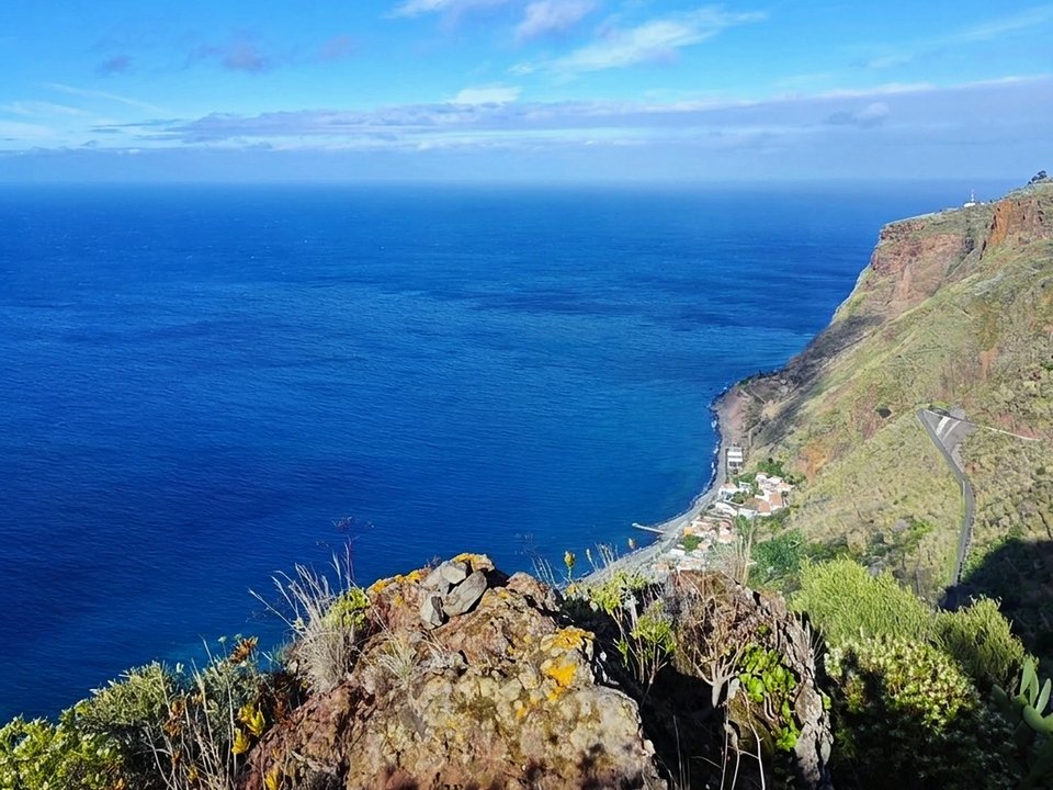 Steep rocky staircases climbing the dramatic coastal escarpment of Vereda da Atalaia
