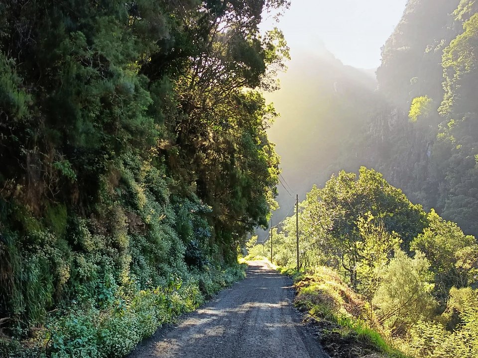 Cascading mountain streams and lush mossy ravines beneath the central peaks
