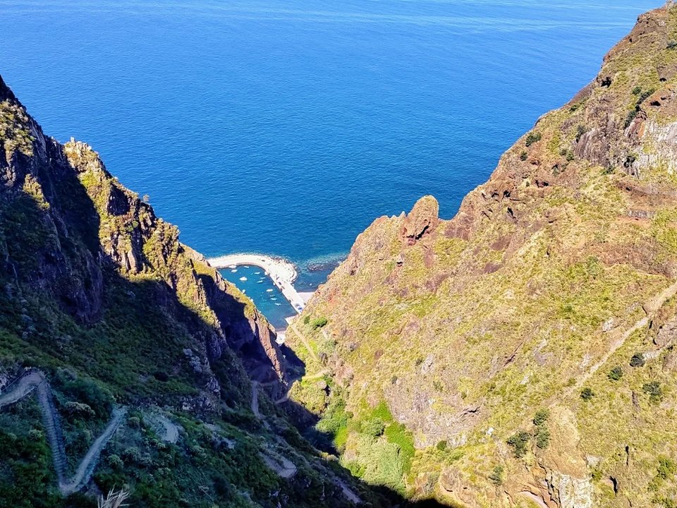 Exhilarating cliffside footpath traversing sheer coastal drops at Vereda da Maloeira