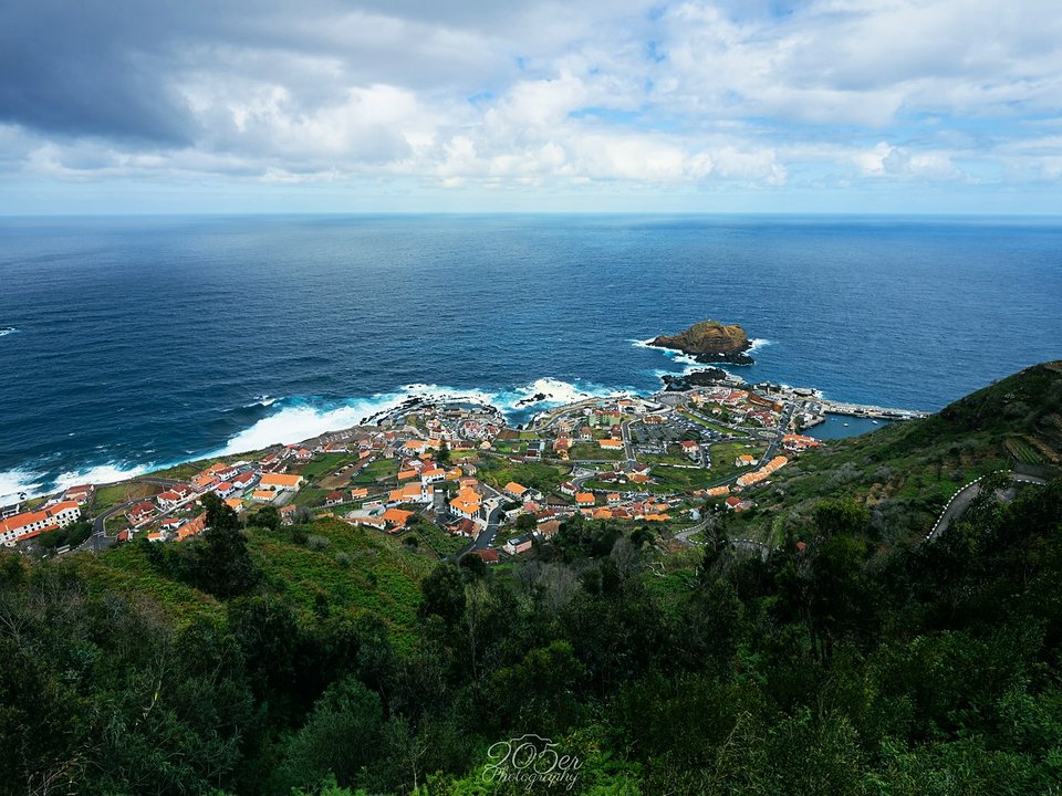 Elevated viewpoint looking down upon the natural volcanic swimming pools of Porto Moniz